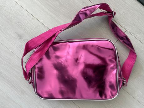 Top model taska cez plece, 