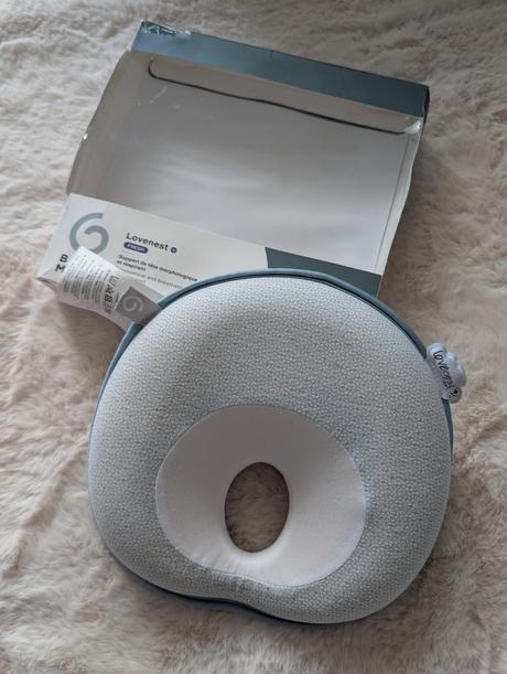 Redukčný vankúš proti zaležanej hlavičke bábätka, 