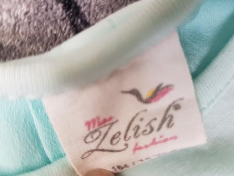 Malo nosena tunika, 164