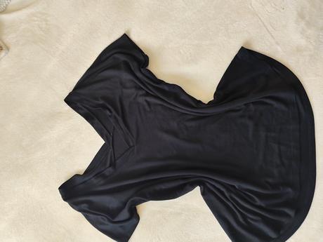 Balík oblečenia zeny, s