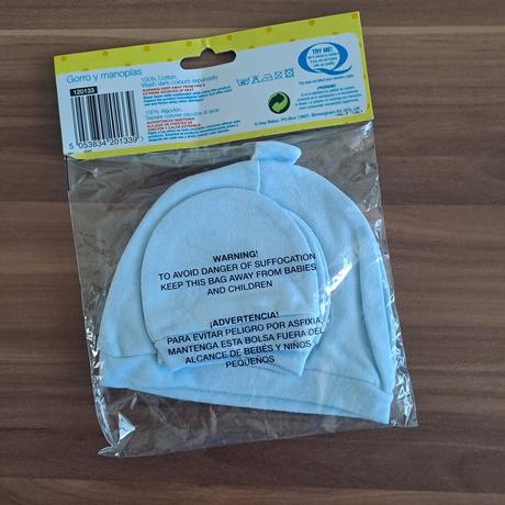 Čiapka a rukavičky, 56