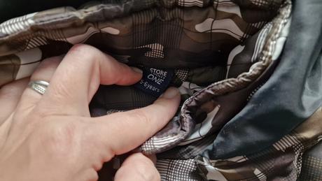 Maskáčova bunda, 116