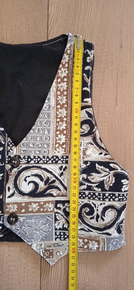 Elegantná vesta, 116