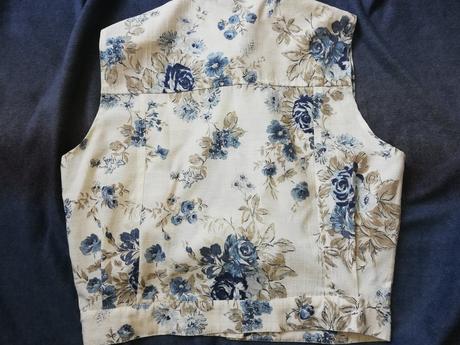 Kvetovaná vesta l, l