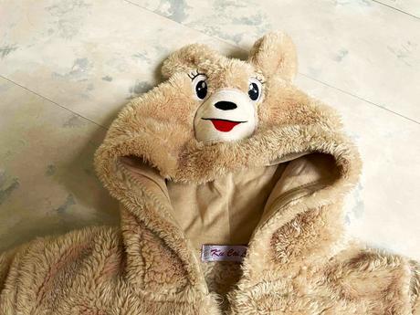 Teplá huňatá bundička 146/152, 146