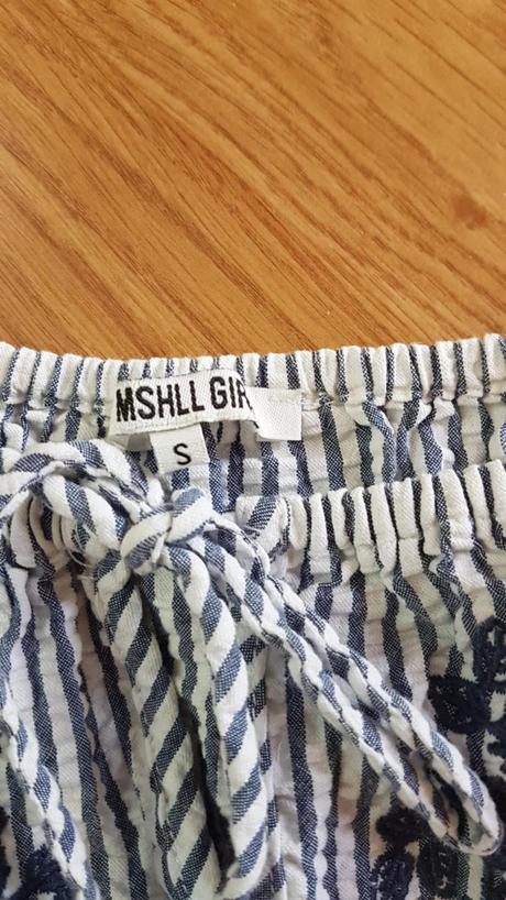 Pásikovaný overal v. s, s