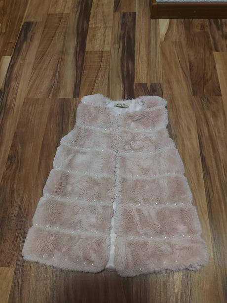 Kožušinová vesta, 116