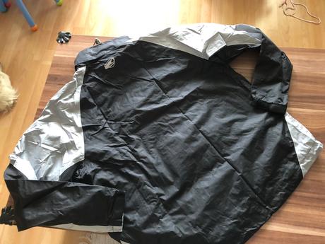 Prechodna bunda vo vrecku crane, xl