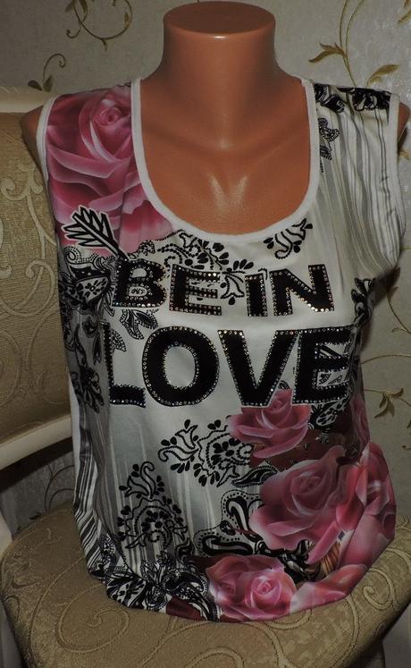 Voľná tunika s kvetmi,