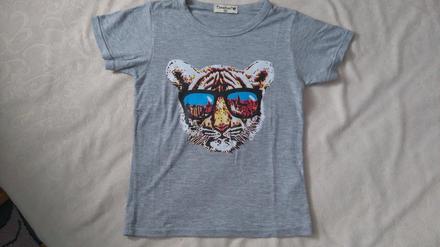 Tričko s tigrou hlavou a okuliarmi, 116