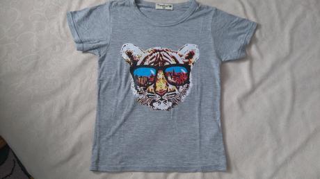 Tričko s tigrou hlavou a okuliarmi, 116