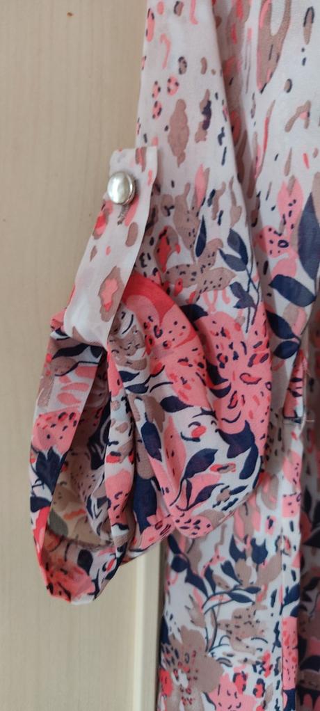 Kvetinová tunika, 42