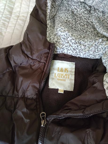 Tmavohnedá bunda, 128