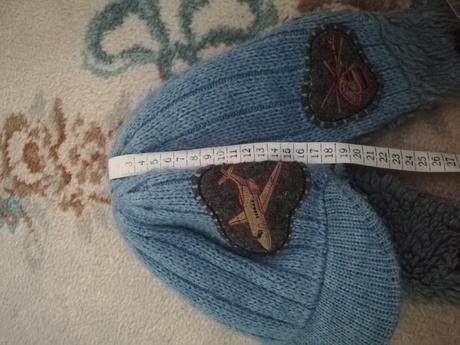 Teplučká čiapka, 128