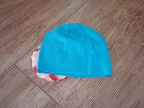 Čiapočka s kvietočkou, 98