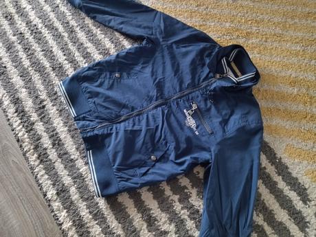 Prechodná tenká bunda, 122