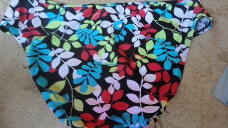 1x oblecene listocky, resort,48