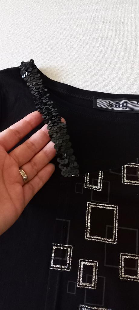 Elegentný top s trblietkami, s