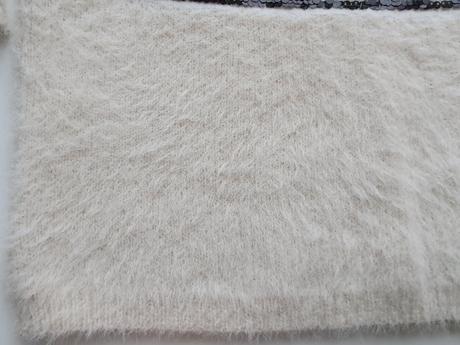 Chlpatý veter s flitrami, 110