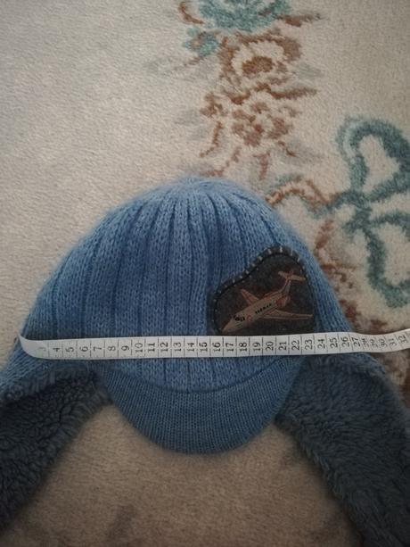 Teplučká čiapka, 128