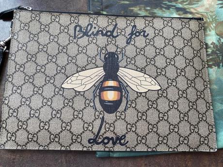 Original gg supreme blind for love wristlet pouch, gucci