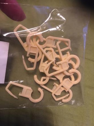 Úchytky na záclony 11 ks,