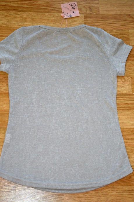 Pulóver so zlatými kamienkami,