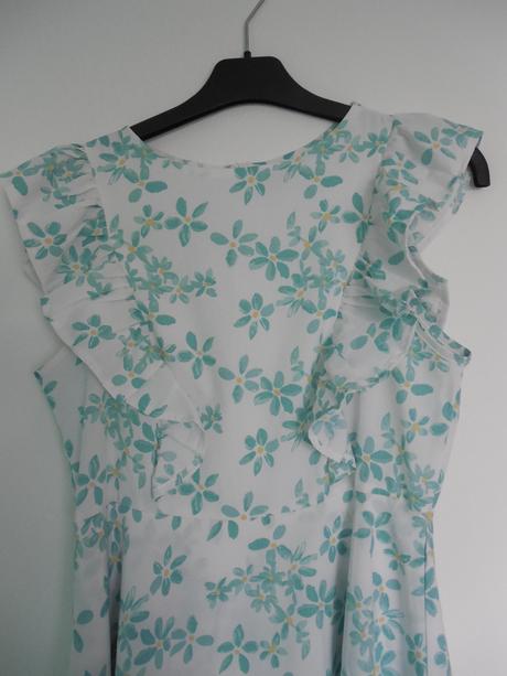Kvietkované šaty, 36