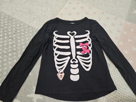 Tricko so smrtkou, 146