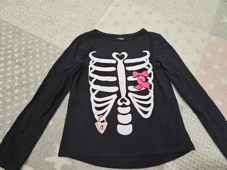 Tricko so smrtkou, 146