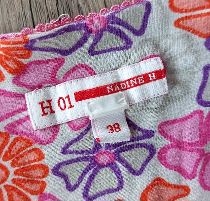 Kvetinové šaty, 38