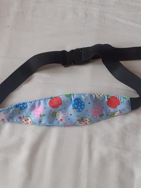 Opora hlavičky na autosedačku, 