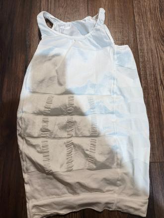 Sťahujúce tielko, l