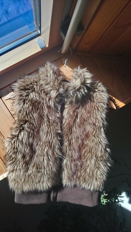 Kožúšková vesta, 164