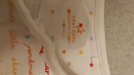 Neutrálny overal farebný text 62, next,62