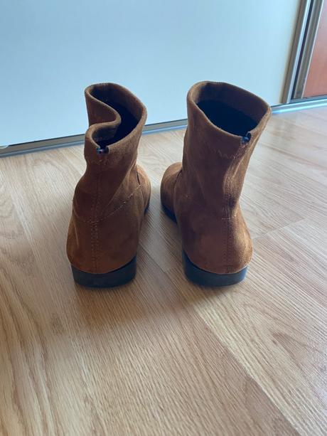 Kotnikove čižmy, 31