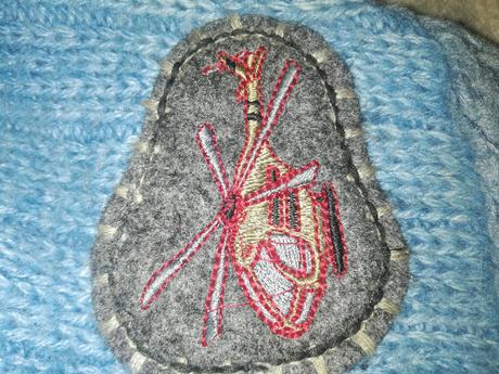 Teplučká čiapka, 128