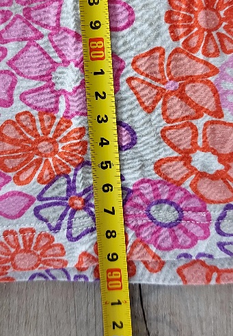 Kvetinové šaty, 38