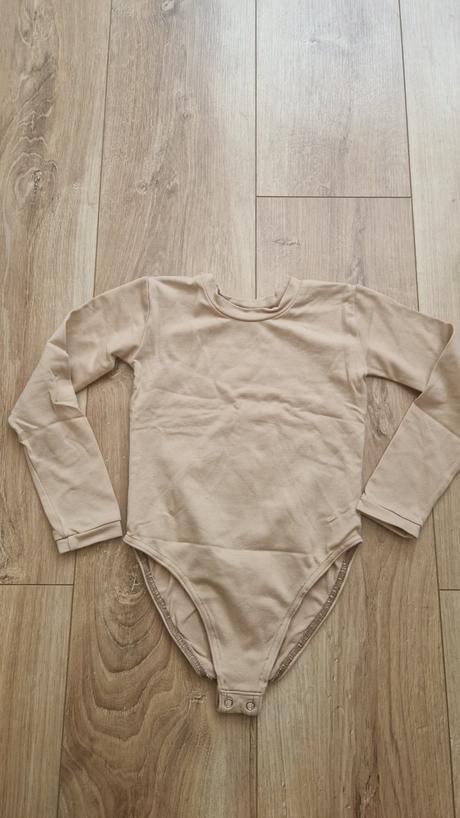 Krasokorčuliarke telové body veľ 122-128 cm., 122