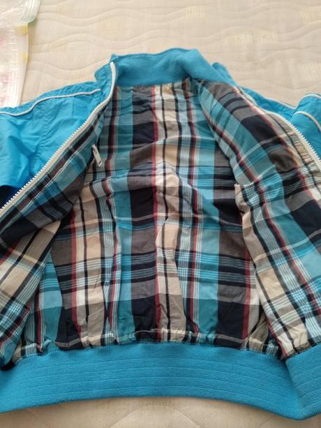 Tyrkysová bunda, 92