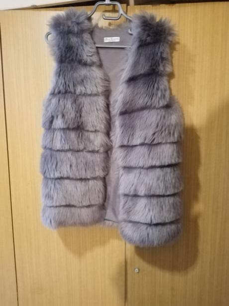 Dámska kozusinkova vesta, 