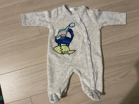 Teplý overal s dinosaurami, 56