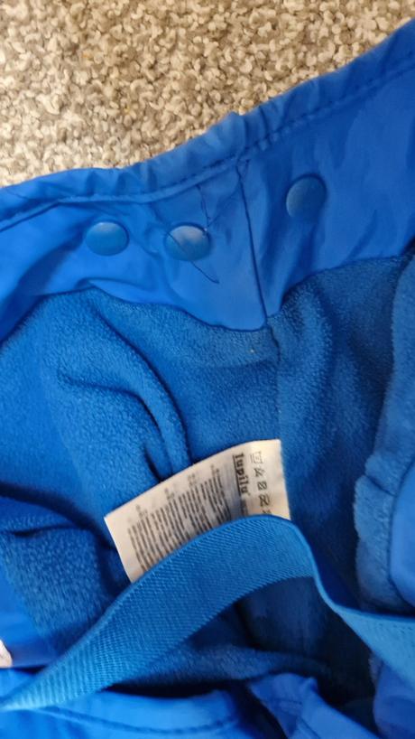 Nohavice do dažďa, lupilu,104