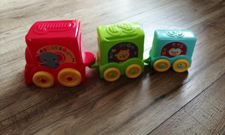 Fisher price veselý skladací vláčik, 