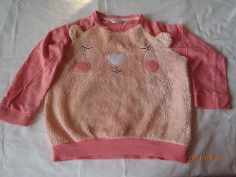 Ružový pulover, 110