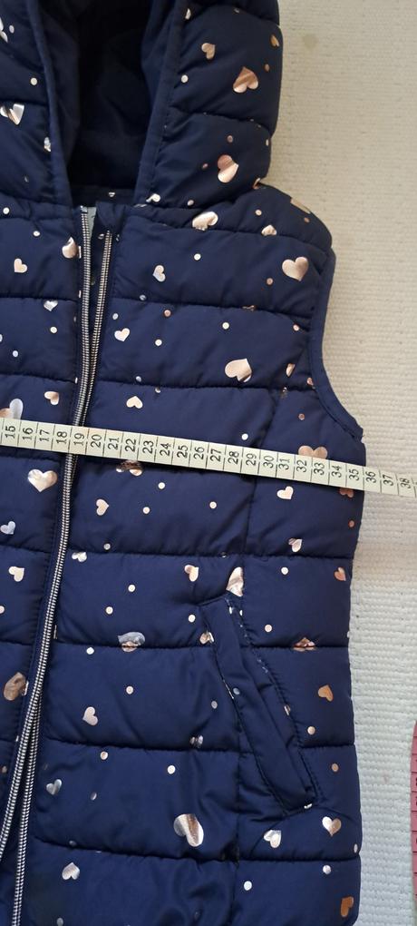 Zateplená vesta, 122