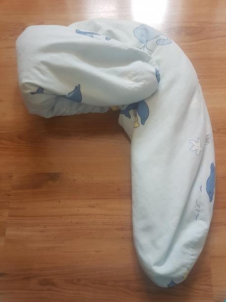 Polohovací túliaci vankúš,