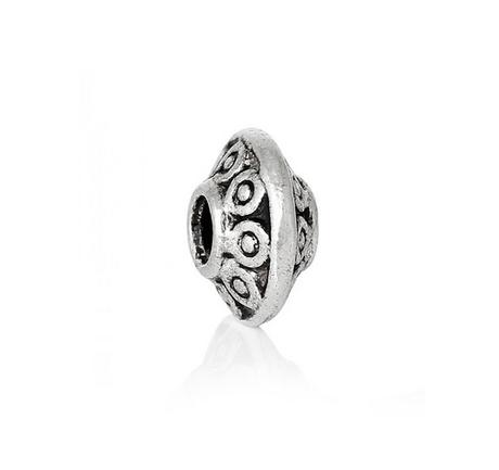 Kovová korálka 7x4 mm, 