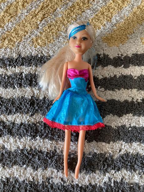 Bábika s modrým pramienkom, 