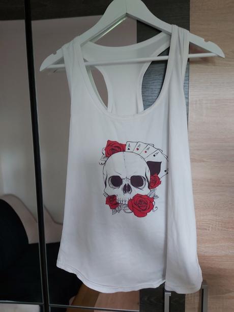 Biele tielko s lebkou., s